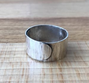 Silver wrap round ring made with Hampshire School of Jewellery in Basingstoke